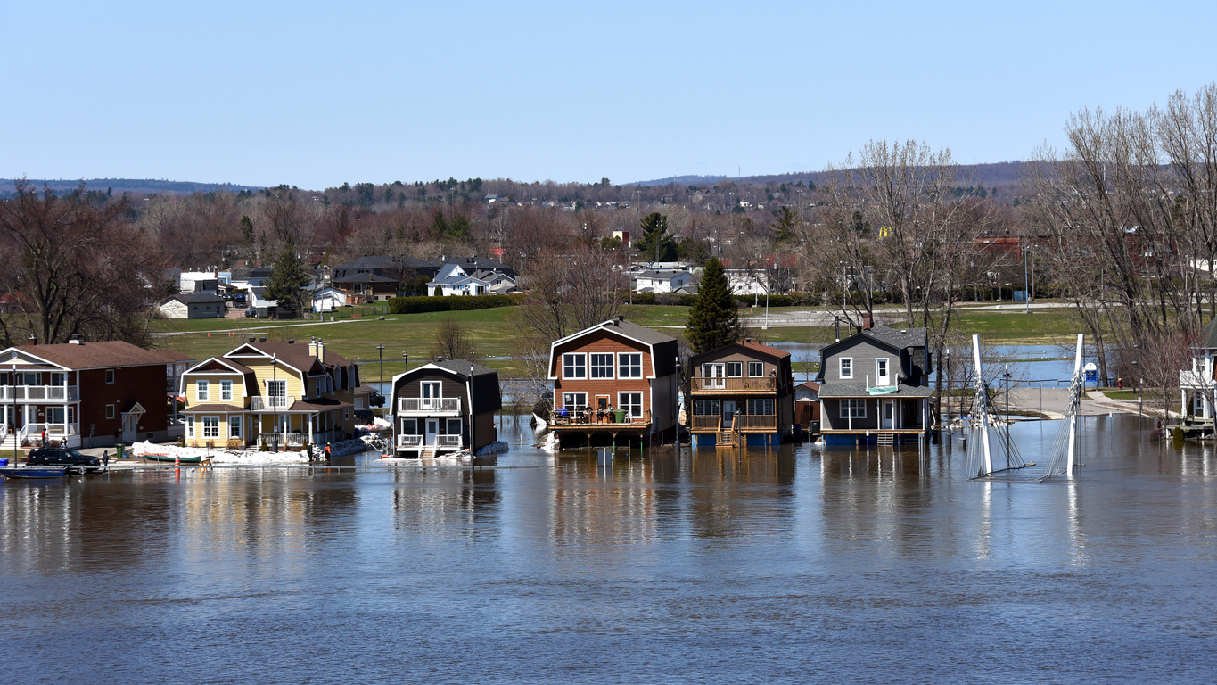 Gatineau, Canada - April 28, 2019:  The severe flooding on Rue Jaques-Cartier along the Quebec side of the swollen Ottawa River. Pointe Gatineau is one of several areas in Eastern Canada that is suffering flood conditions. It is suspected the area will see flood levels will be even worse than they were in spring 2017.