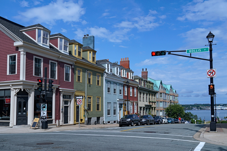 Halifax, Nova Scotia, Canada - August 19, 2019:   Many old 19th century buildings are preserved near the waterfront, such as this colorful row of houses.