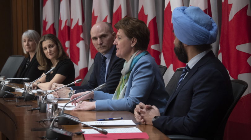 Minister of Health Patty Hajdu, Deputy Prime Minister and Minister of Intergovernmental Affairs Chrystia Freeland, President of the Treasury Board Jean-Yves Duclos, and Innovation, Science and Industry Minister Navdeep Bains look on as Minister of Agriculture and Agri-Food Minister Marie-Claude Bibeau speaks during a news conference on the COVID-19 virus in Ottawa, Monday March 23, 2020. THE CANADIAN PRESS/Adrian Wyld