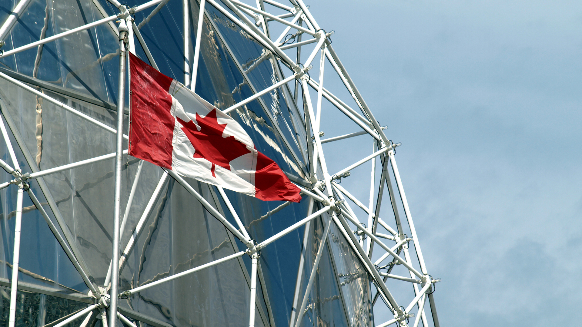 World of science dome and Canadian flag in Vancouver, BC